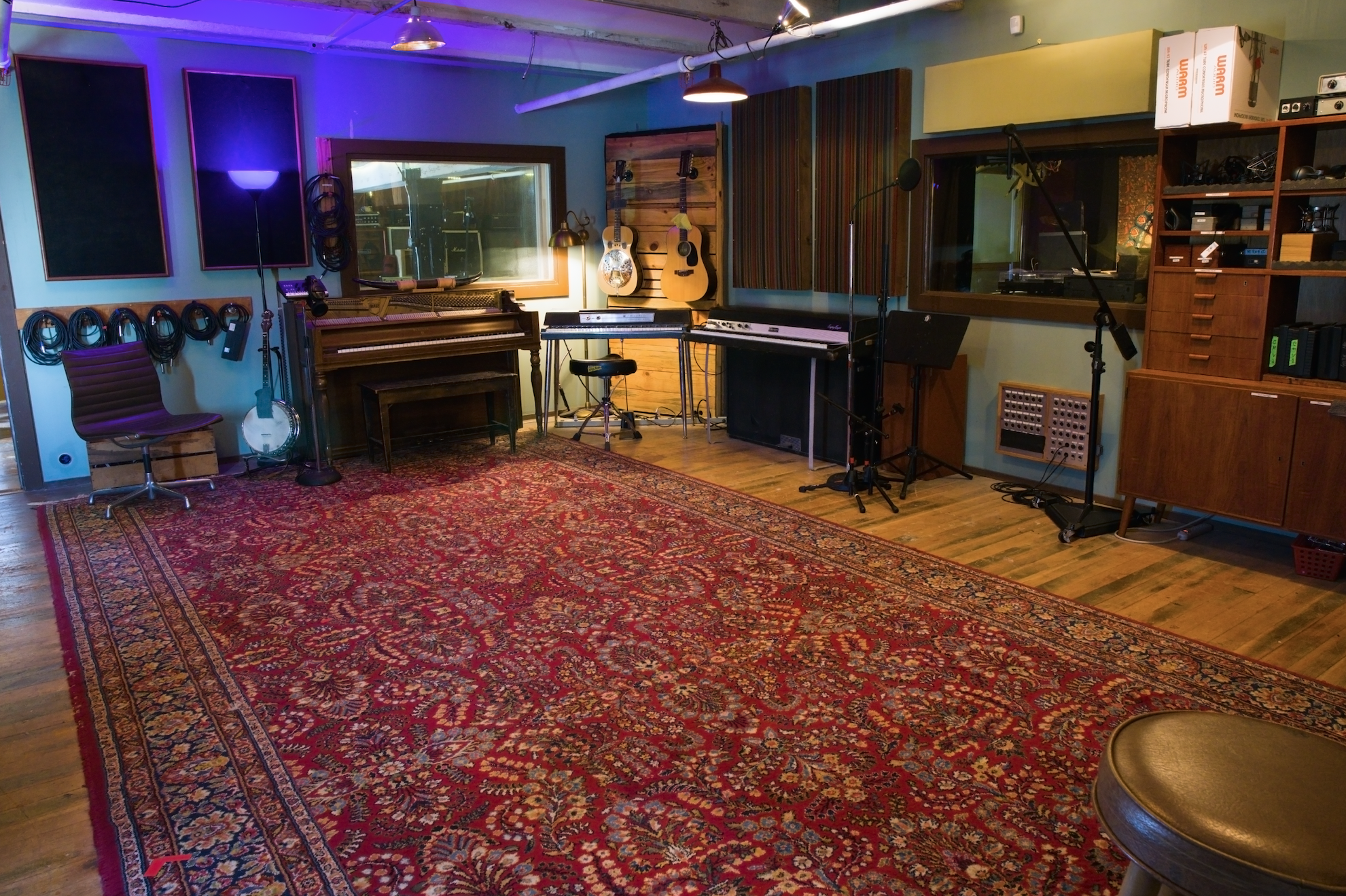 a rehearsal space with various instruments inside Echo Echo recording studio